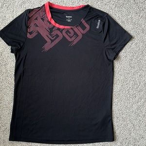 Reebok Women’s large sports T. Black with coral trim.